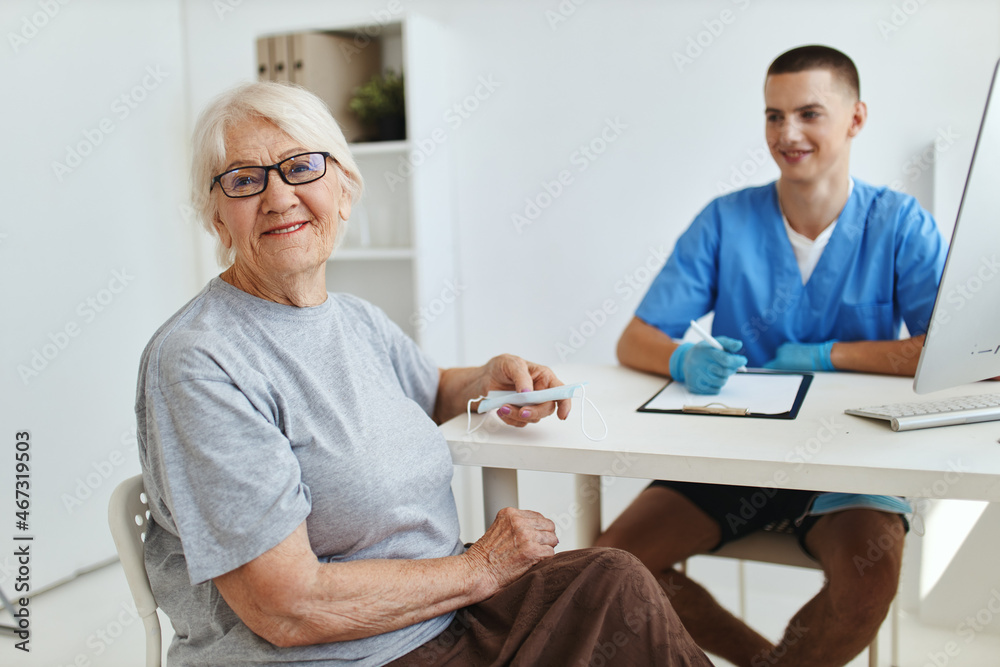 elderly woman sitting in the doctor's office visit to the hospital elderly woman sitting in the doctor's office visit to the hospital