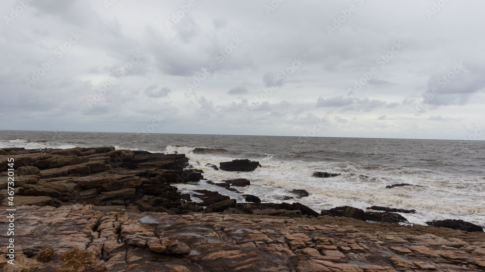 A view of the sea on a embankment of rocks