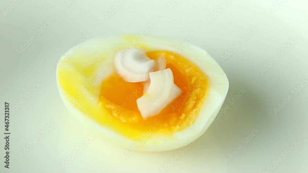 Topping chopped onion and chili on Soft boiled eggs spicy salad , close up in studio Chiangmai Thailand. Topping chopped onion and chili on Soft boiled eggs spicy salad , close up in studio Chiangmai Thailand.