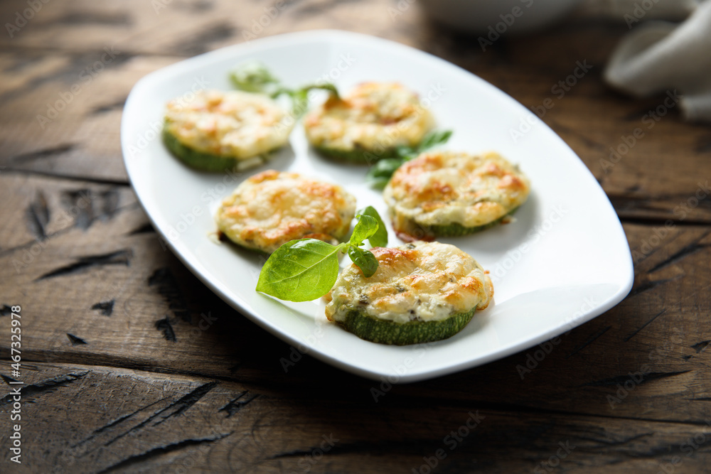 Roasted courgette with cheese and herbs Roasted courgette with cheese and herbs