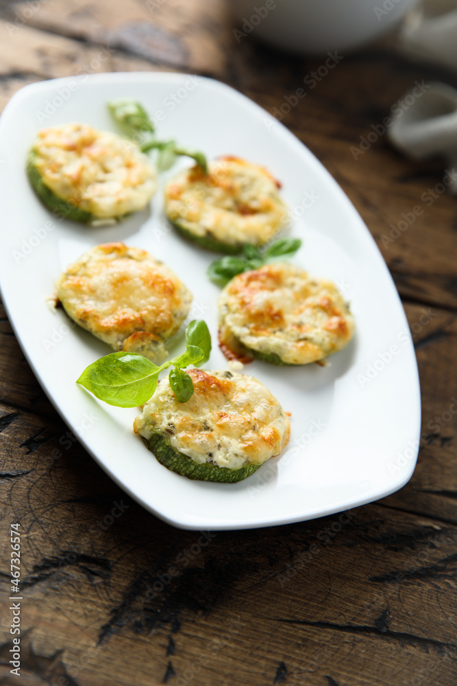 Roasted courgette with cheese and herbs Roasted courgette with cheese and herbs