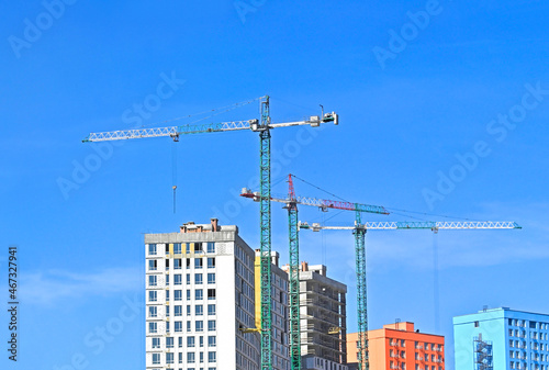 Crane and highrise construction site