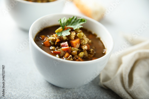 Traditional homemade lentil soup with smoked sausage