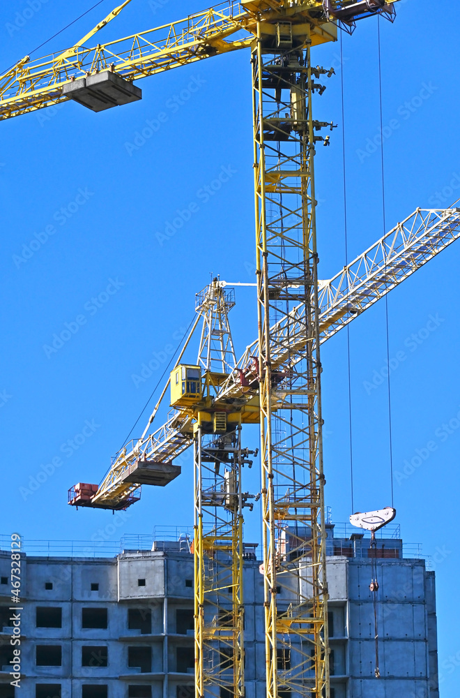 Crane and highrise construction site