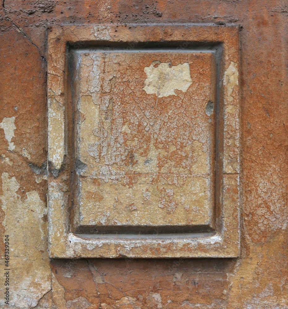 Blank memorial plaque of a brown and beige stone with cracks and chipped painting - flat surface background with epic texture Blank memorial plaque of a brown and beige stone with cracks and chipped painting - flat surface background with epic texture