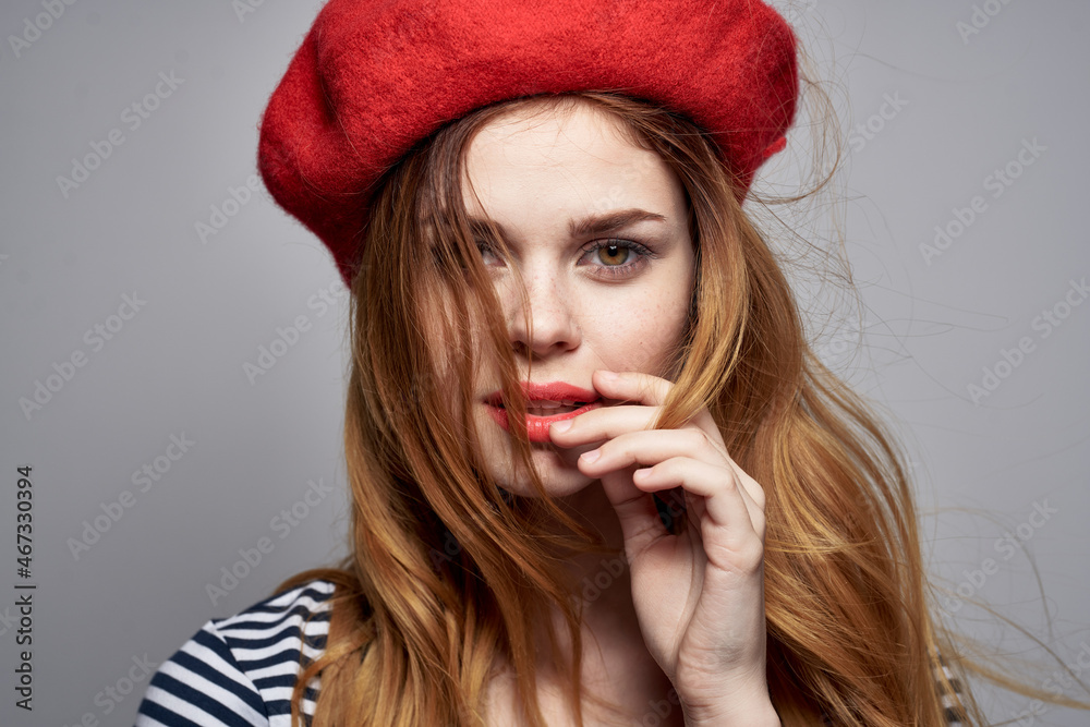 beautiful woman wearing a red hat makeup France Europe fashion posing lifestyle beautiful woman wearing a red hat makeup France Europe fashion posing lifestyle