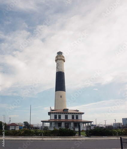 Black And White Lighthouse with Blue Sky and White Clouds