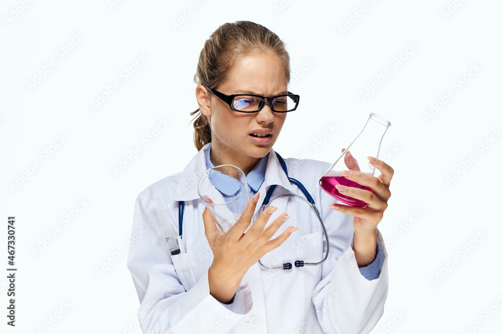 female laboratory assistant in white coat chemical solution analyzes research female laboratory assistant in white coat chemical solution analyzes research