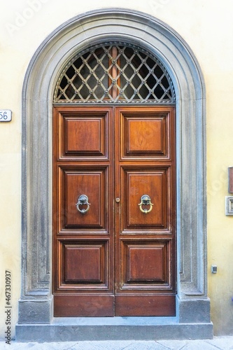 Old wooden door with metal coating