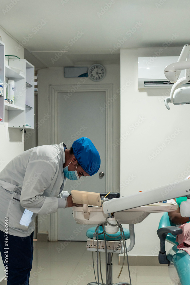 Fototapeta premium Dentist Preparing Dental Tool For Treatment