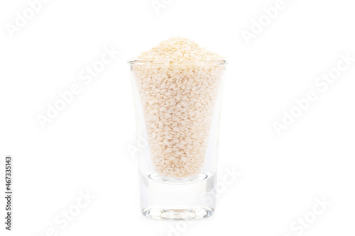 white sesame seeds organic on white background. Health food concept.