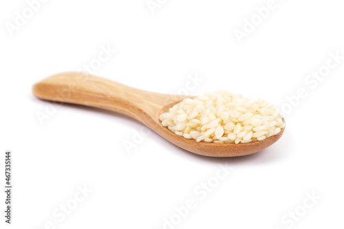white sesame seeds organic on white background. Health food concept.