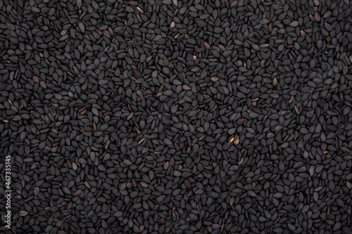 Black sesame seeds organic on white background. Health food concept.