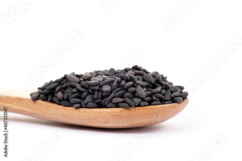 Black sesame seeds organic on white background. Health food concept.
