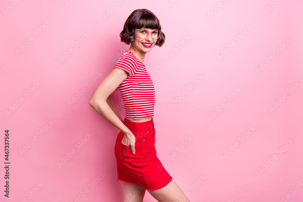Photo portrait girl in glasses pretty wearing red clothes isolated pastel pink color background