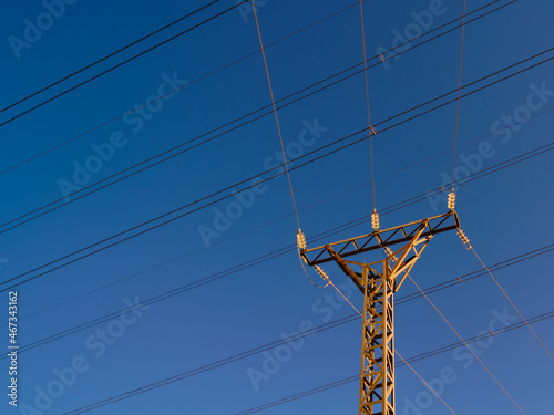 electric tower high voltage wire composition sunset blue sky