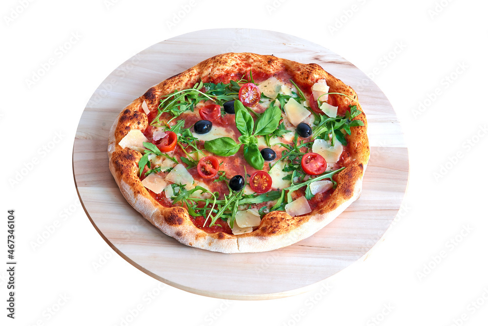 Overhead  shot of Bufala pizza on wooden plank.