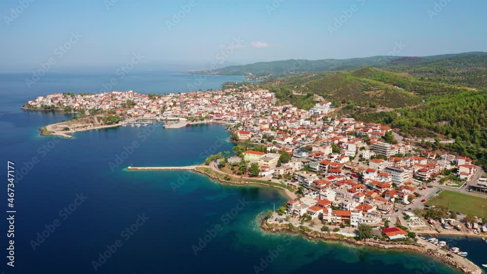 Aerial drone view of Neos Marmaras city, roofs, sea. Halkidiki. Northern Greece Aerial drone view of Neos Marmaras city, roofs, sea. Halkidiki. Northern Greece