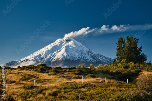Cotopaxi volcano with a distinct plume of smoke photo