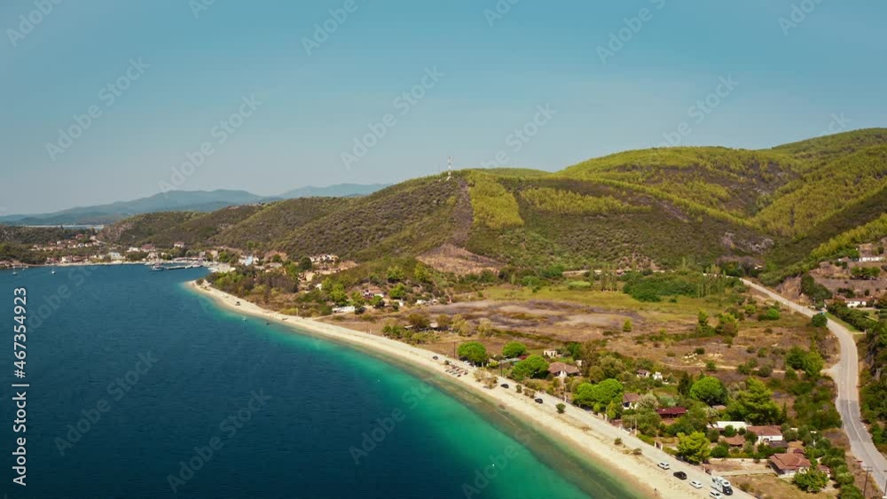 Aerial nature view of beach, marina, mountain in Porto Koufo in Chalkidiki. Greece Aerial nature view of beach, marina, mountain in Porto Koufo in Chalkidiki. Greece