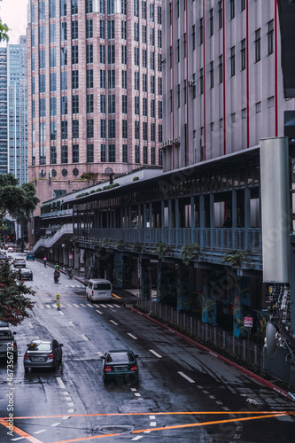 Elevated view of a Makati street and its elevated covered walkway on a wet day. Urban Landscape.