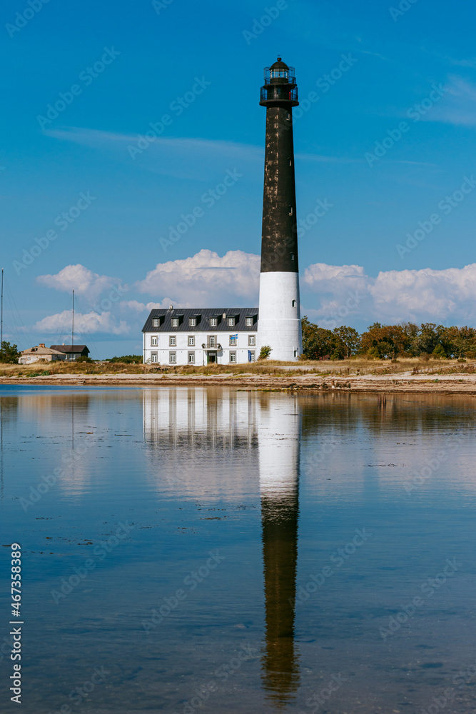Sorve lighthouse on the Sorve Peninsula in Saaremaa, Estonia. Beautiful black and white lighthouse on the coast of the Baltic Sea