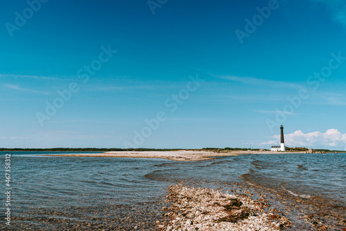 Sorve lighthouse on the Sorve Peninsula in Saaremaa, Estonia. Beautiful black and white lighthouse on the coast of the Baltic Sea