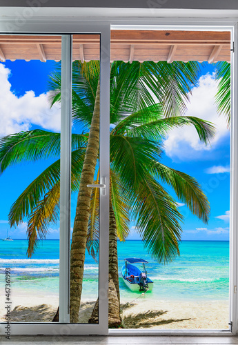 large glass door overlooking the beach