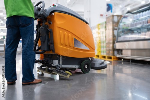 cleaning floor with machine