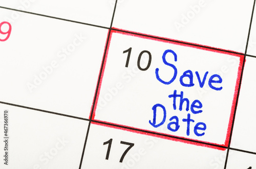 Save the Date written on a calendar