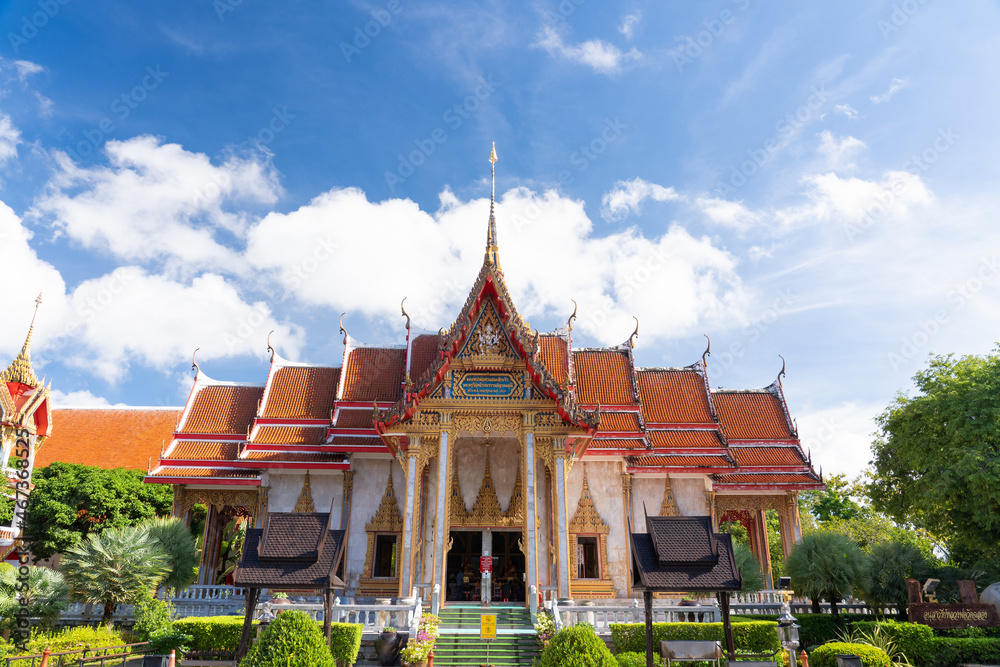 Naklejka premium thai temple Wat chalong Buddhist landmark of Phuket with cloud and famous travel in Thailand