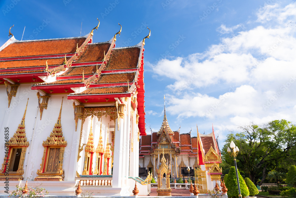 Naklejka premium thai temple Wat chalong Buddhist landmark of Phuket with cloud and famous travel in Thailand