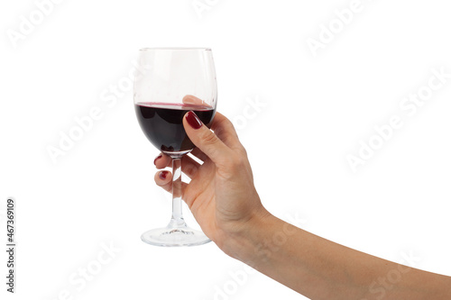 the girl holds a glass with red wine large plan isolated on white. Alcohol, pleasure, drunkenness