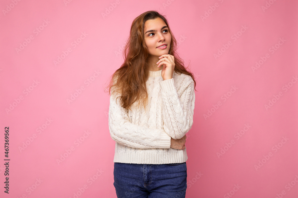 Shot of young attractive caucasian woman in trendy casual clothes. Sexy carefree female person posing isolated pink wall in studio. Positive thoughtful dreaming model with natural makeup. Empty space Shot of young attractive caucasian woman in trendy casual clothes. Sexy carefree female person posing isolated pink wall in studio. Positive thoughtful dreaming model with natural makeup. Empty space