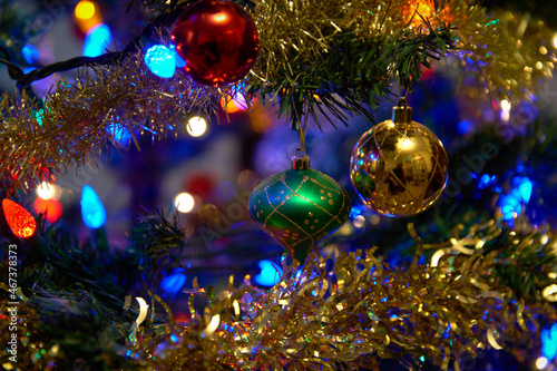 Ornamental Christmas Baubles on Tree. Festive decorations on a Christmas tree.
