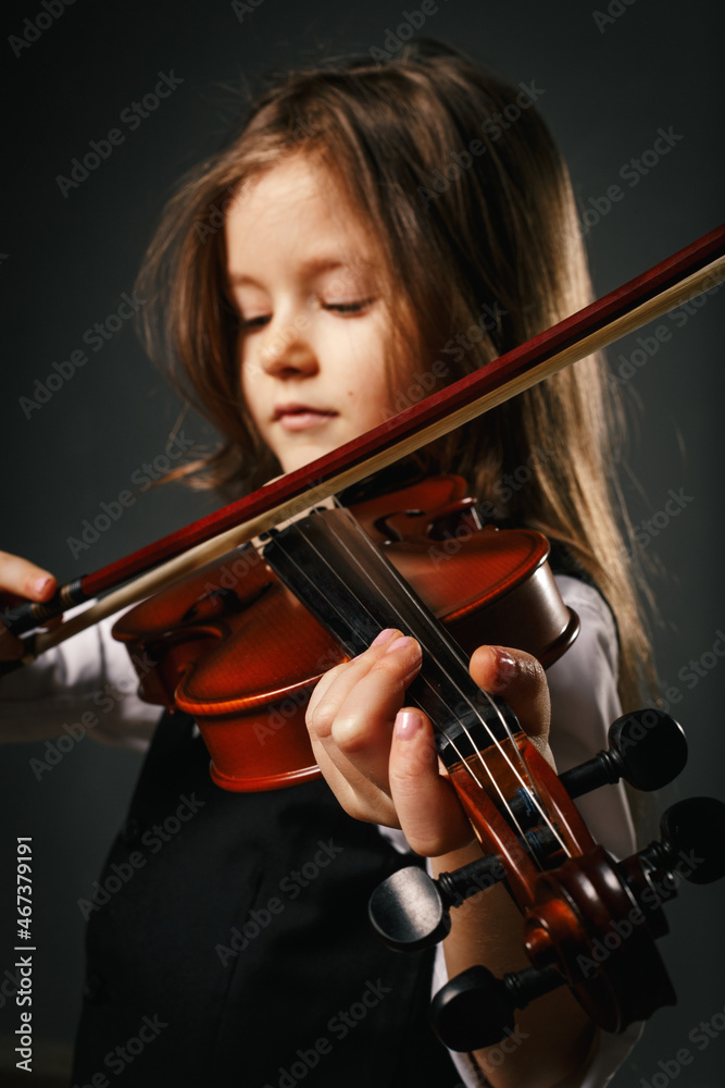 Young girl closeup studio portrait with violin Young girl closeup studio portrait with violin