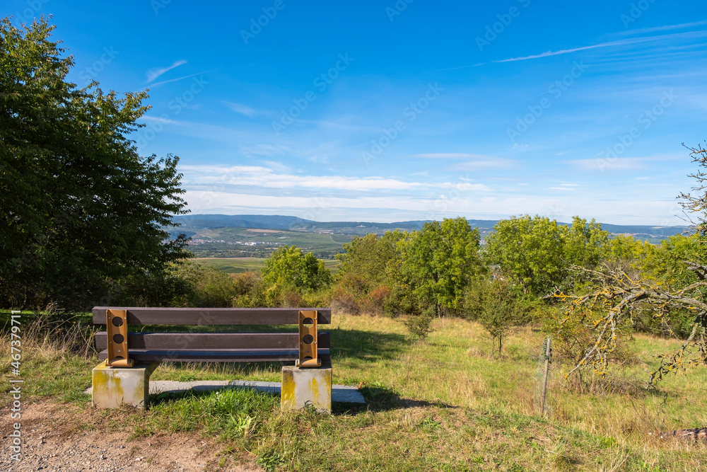 Bench with a view from Rheinhessen to the Rheingau / Germany in early autumn Bench with a view from Rheinhessen to the Rheingau / Germany in early autumn