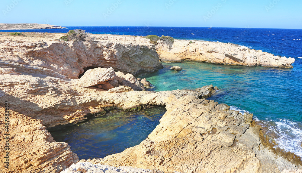 landscape of natural pool inside the rocks at Ano Koufonisi island Greece