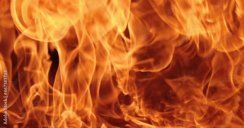 Flames of fire on black background in slow motion Flames of fire on black background in slow motion