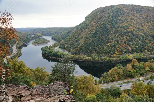 The aerial view of the traffic and scenery of fall foliage from the top of Mount Tammany Red Dot Trail near Hardwick Township, New Jersey, U.S.A photo