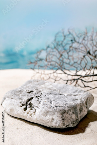 Summer sand sea beach with waves and stone podium