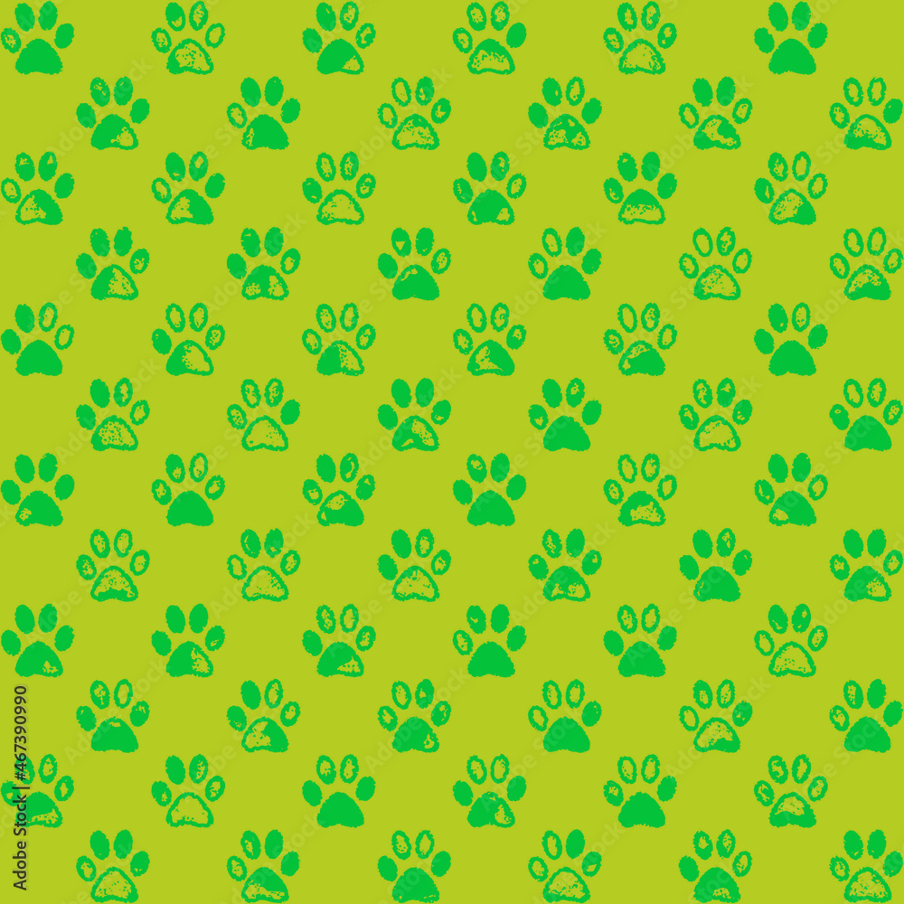Green paw prints on yellow background, a seamless pattern