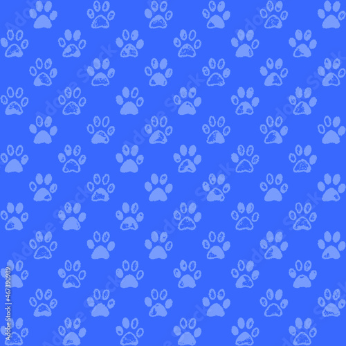 Light blue paw prints on darker background, a seamless pattern