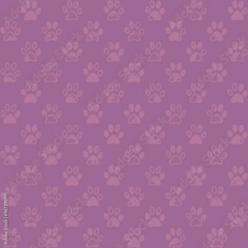 Paw prints in old rose tones; a seamless background pattern