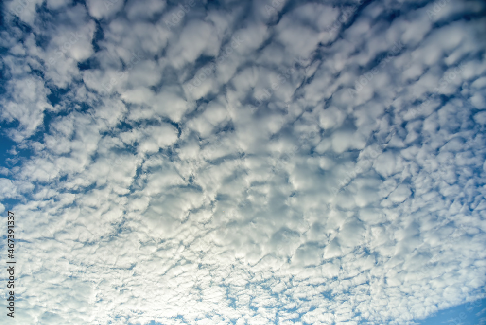 Puffy fluffy white clouds against daytime sky. Puffy fluffy white clouds against daytime sky.