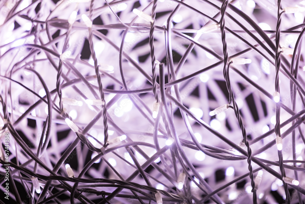 Fototapeta premium White and purple led lights to celebrate Christmas and other celebrations. Christmas and celebrations and festivities concept.
