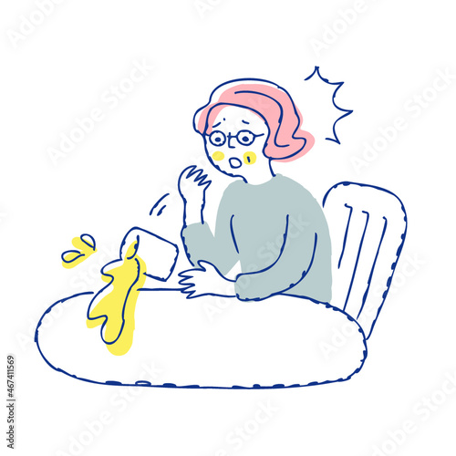 お茶をこぼすシニア女性