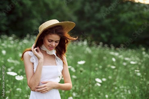 Woman in white dress on nature flowers rest charm