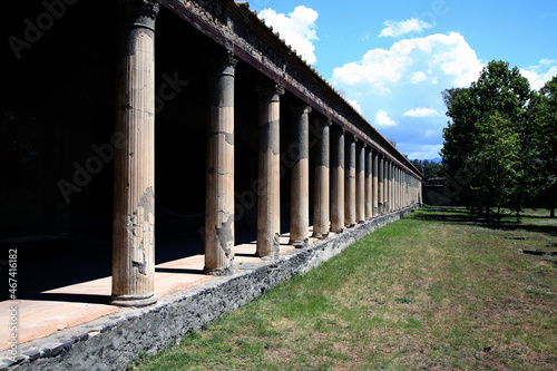 Colonnade of the Great Palestra in the green, Pompeii, Campania, Italy photo