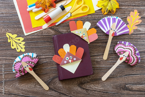 Thanksgiving craft bookmark turkey paper and toy stics puppets turkey. Childrens art project, handmade, crafts for kids.